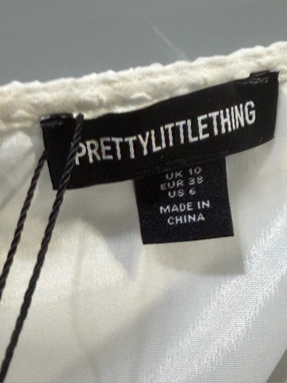 PrettyLittleThing White Tiered Skater Dress - Picture 6 of 7